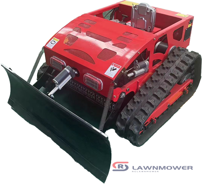RC mower with snow blade on tracks