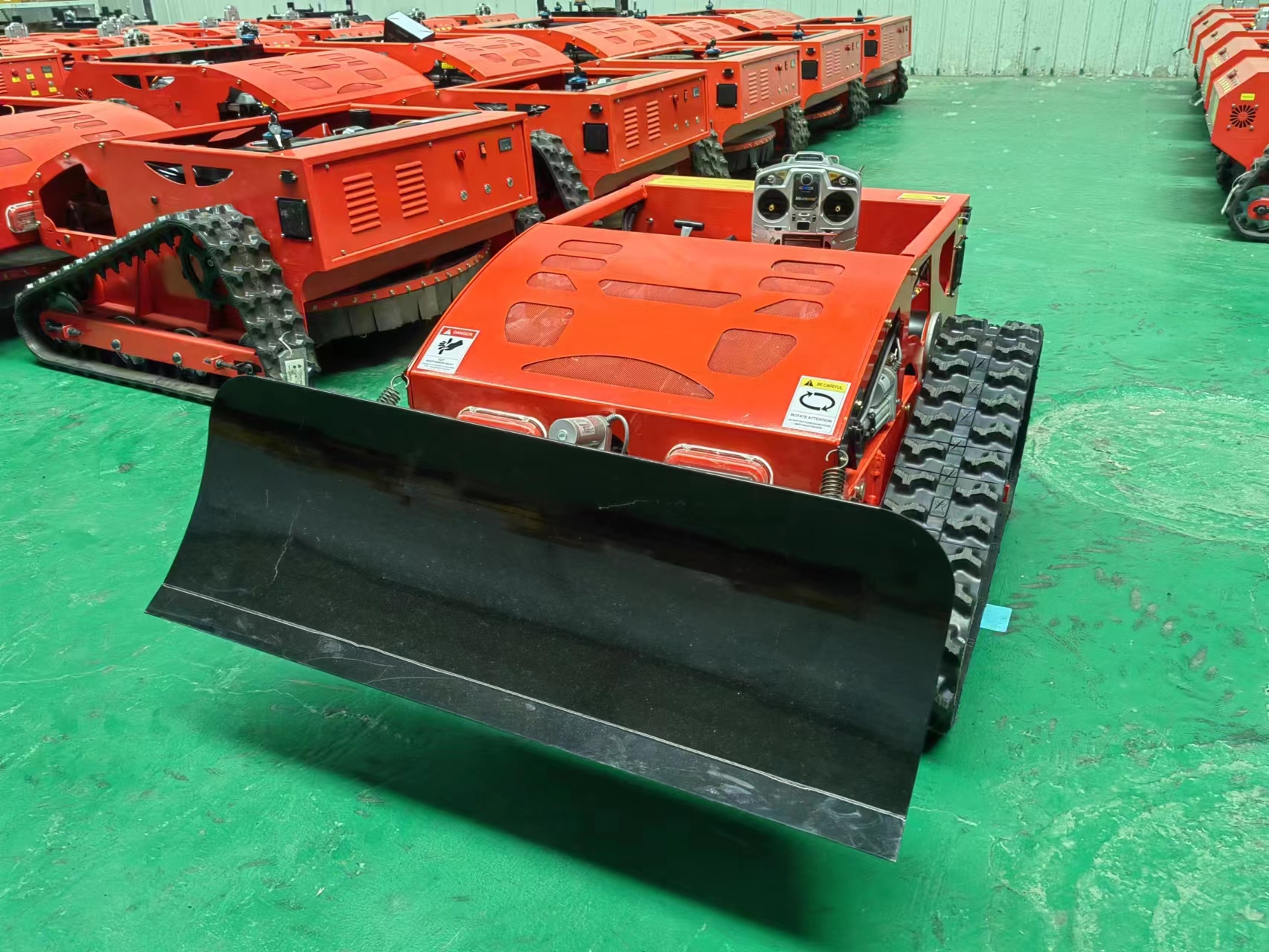 RC lawn mower with tracks