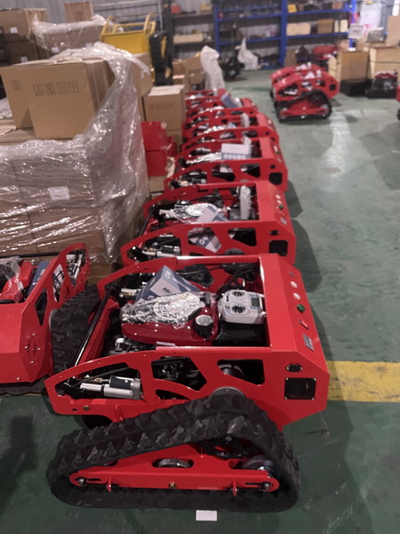 Robotic mower charging at base station